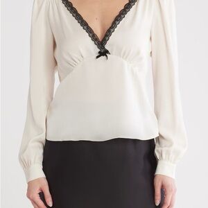 Elegant Cream and Black Blouse
